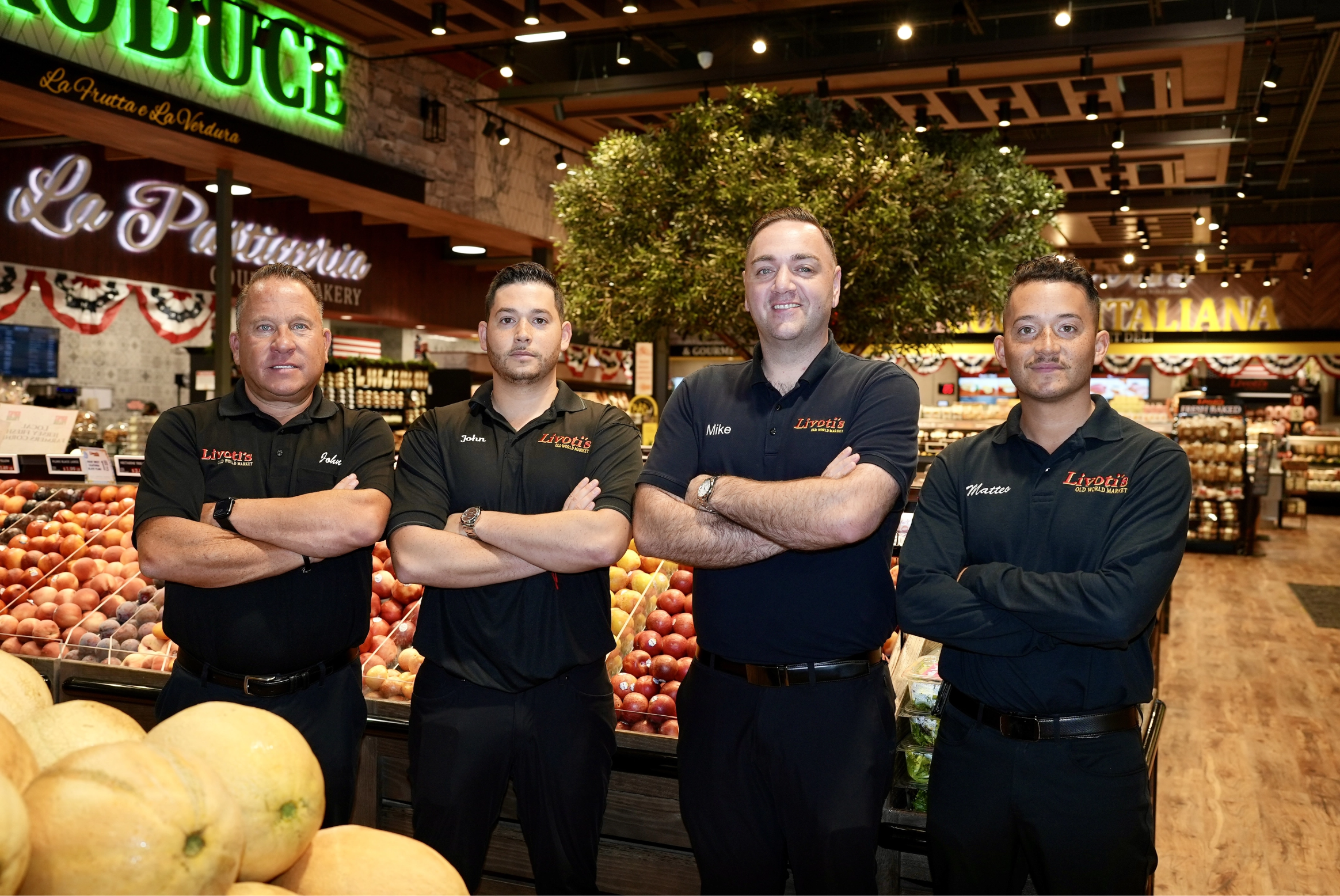 Livoti family standing in the store